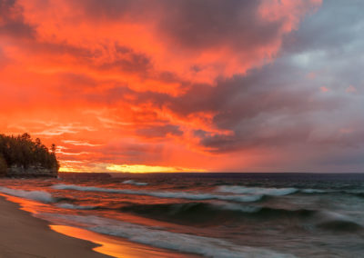 Dramatic sunset light light along Miners Beach in Pictured Rocks National Lakeshore, Michigan, USA